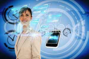 Businesswoman with interface and smartphone