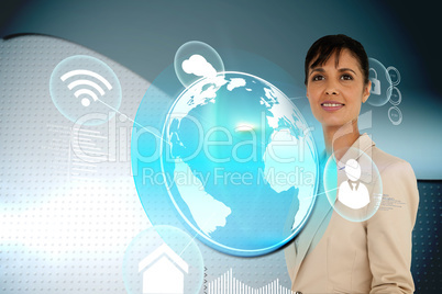 Businesswoman with earth and app interface