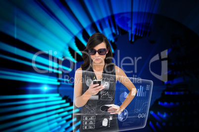 Glamorous brunette using smartphone with interface