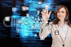 Smiling businesswoman pointing to app icon