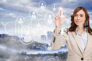 Smiling businesswoman pointing to profile picture