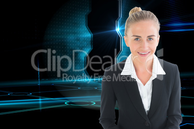 Composite image of businesswoman holding tablet