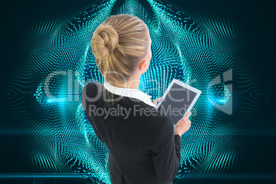 Composite image of businesswoman holding new tablet