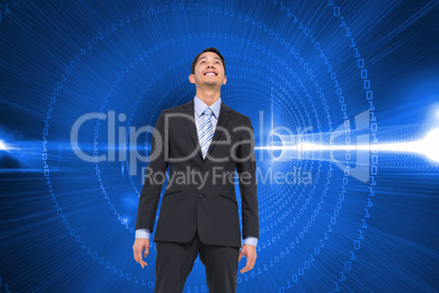 Composite image of smiling asian businessman