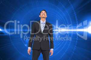 Composite image of smiling asian businessman