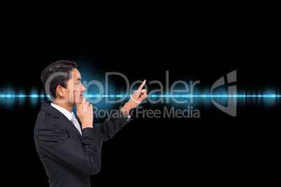 Composite image of thoughtful asian businessman pointing