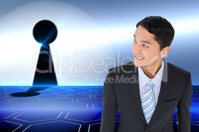 Composite image of smiling asian businessman