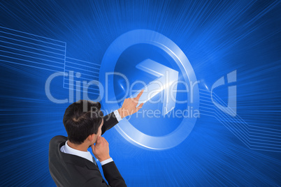 Composite image of thoughtful asian businessman pointing