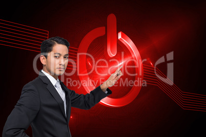 Composite image of unsmiling asian businessman pointing