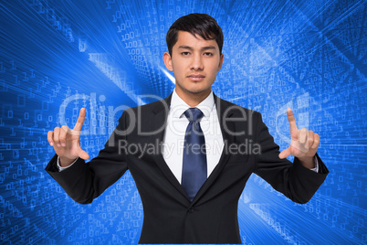 Composite image of unsmiling businessman holding