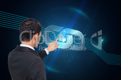 Composite image of asian businessman pointing