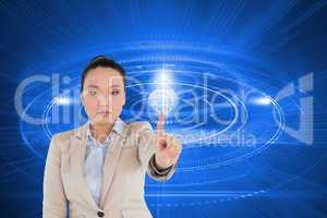 Composite image of unsmiling asian businesswoman pointing