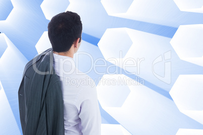 Composite image of businessman standing