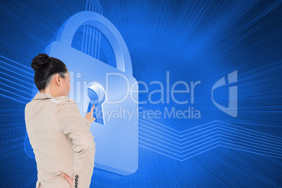 Composite image of asian businesswoman pointing