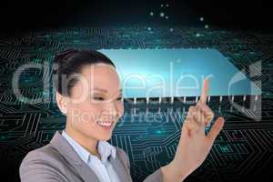 Composite image of smiling asian businesswoman pointing