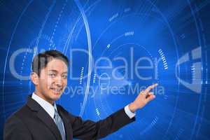 Composite image of smiling asian businessman pointing