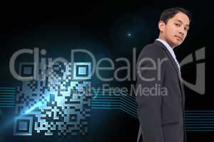 Composite image of serious asian businessman