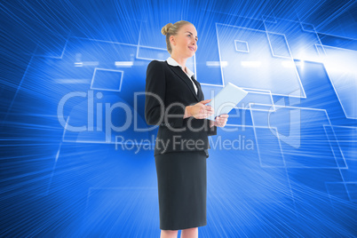 Composite image of businesswoman holding new tablet