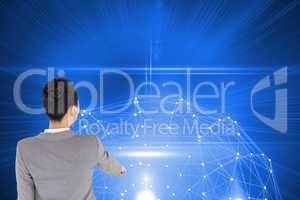 Composite image of asian businesswoman pointing