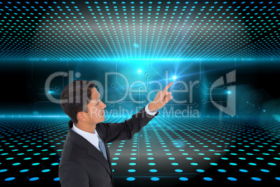 Composite image of stern asian businessman pointing