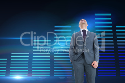 Composite image of businessman standing