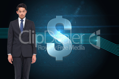 Composite image of stern businessman looking down