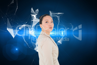 Composite image of unsmiling asian businesswoman