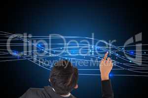 Composite image of asian businessman pointing