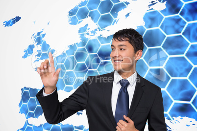 Composite image of smiling businessman touching