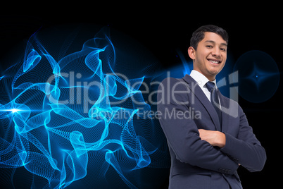 Composite image of smiling asian businessman with arms crossed