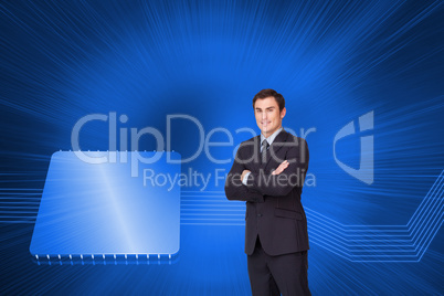 Composite image of young businessman standing cross-armed