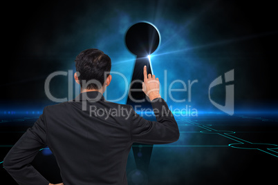 Composite image of asian businessman pointing