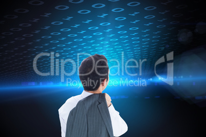 Composite image of businessman standing