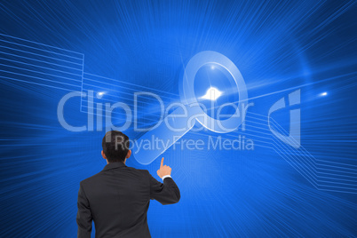 Composite image of asian businessman pointing