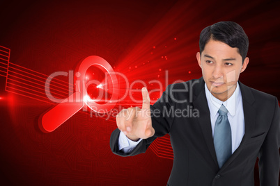 Composite image of unsmiling asian businessman pointing