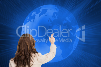 Composite image of brunette businesswoman standing back to camer