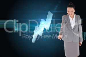 Composite image of smiling asian businesswoman pointing