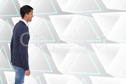 Composite image of smiling casual businessman walking