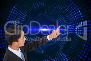 Composite image of unsmiling asian businessman pointing