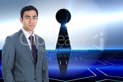 Composite image of unsmiling businessman standing