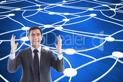 Composite image of stressed businessman with arms raised