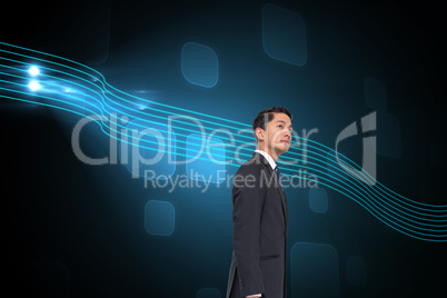 Composite image of serious asian businessman