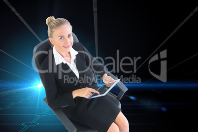 Composite image of businesswoman sitting on swivel chair with ta