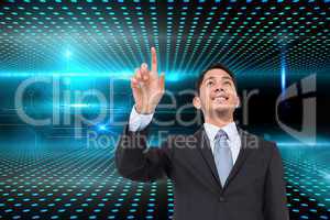 Composite image of smiling asian businessman pointing