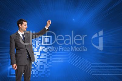 Composite image of smiling businessman holding something up in t