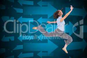 Composite image of happy classy businesswoman jumping while hold
