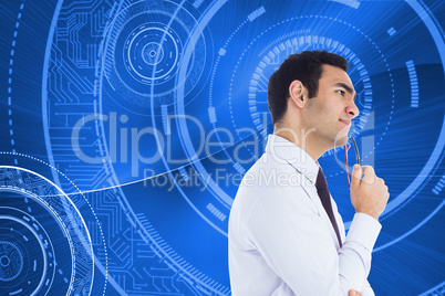 Composite image of thinking businessman holding glasses