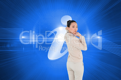 Composite image of thoughtful asian businesswoman pointing