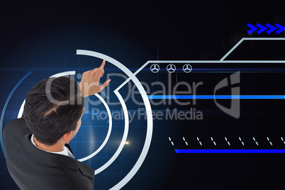 Composite image of asian businessman pointing