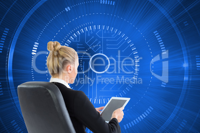 Composite image of businesswoman sitting on swivel chair with ta